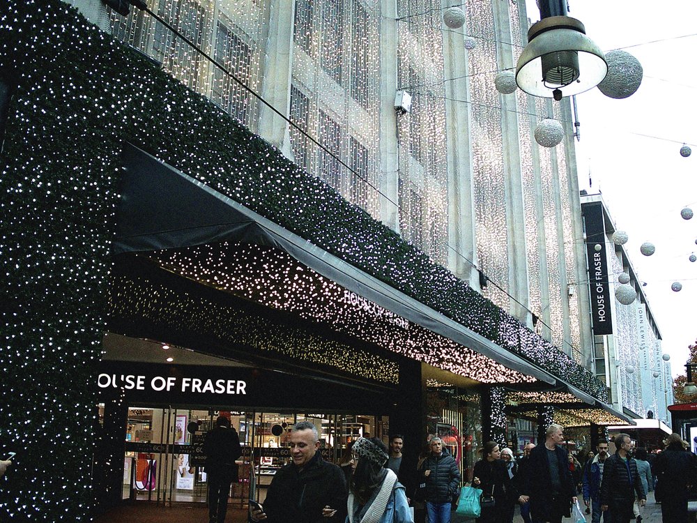 Oxford Street Christmas lights on a dull day in London, Y35 camera, ISO 1600 ‘digiFilm’ (up to ISO 1600, low light, grainy) cartridge, but actually at ISO 300, f2, 1/215th second, 6mm (roughly 35mm equivalent) lens.